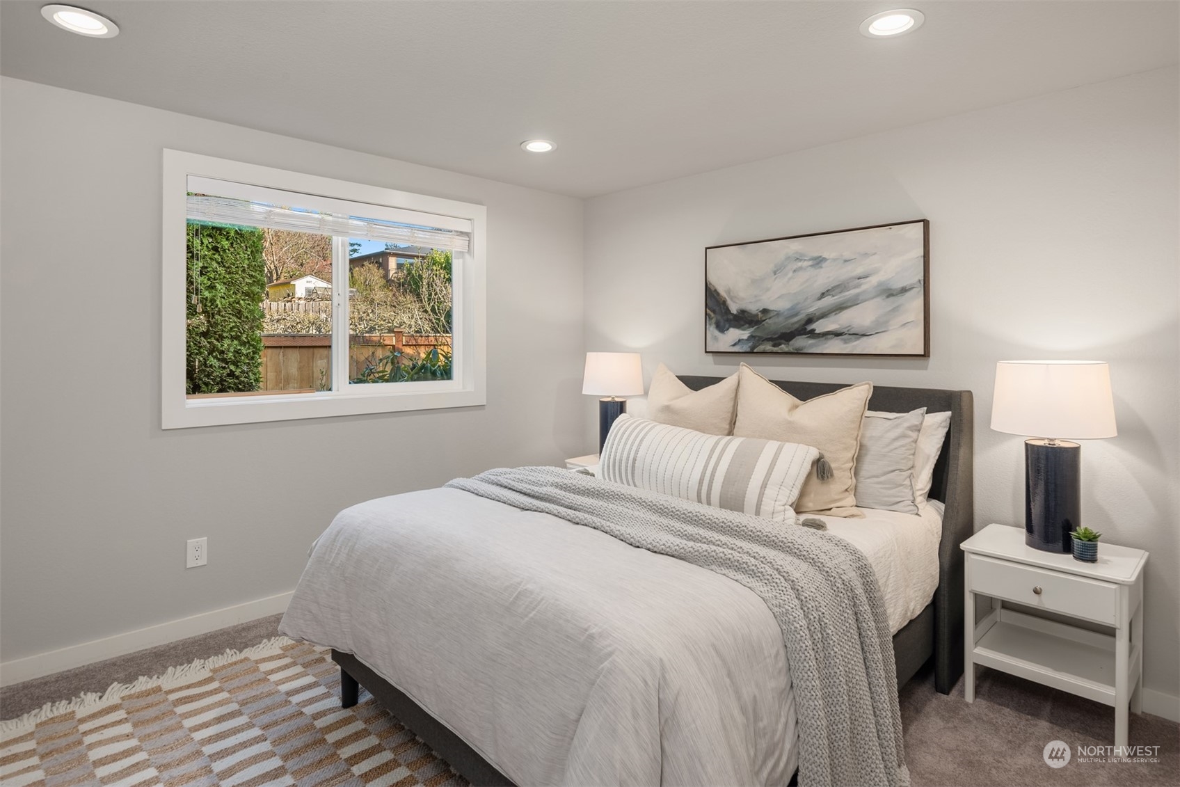 917 9th Avenue South Edmonds, WA 98020 - Photo 22 of 40 a bedroom with a bed and a window