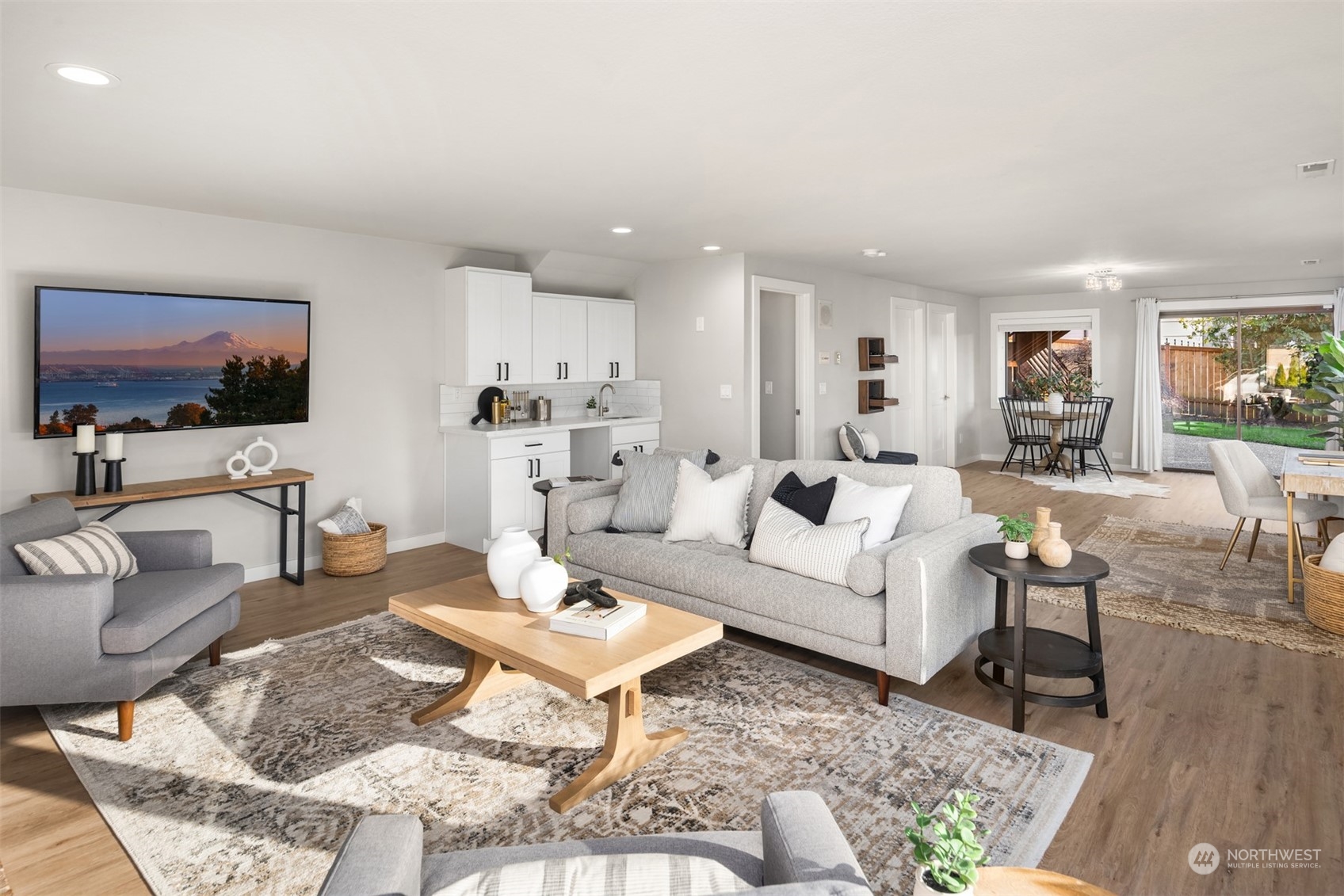 917 9th Avenue South Edmonds, WA 98020 - Photo 24 of 40 a living room with furniture and a flat screen tv