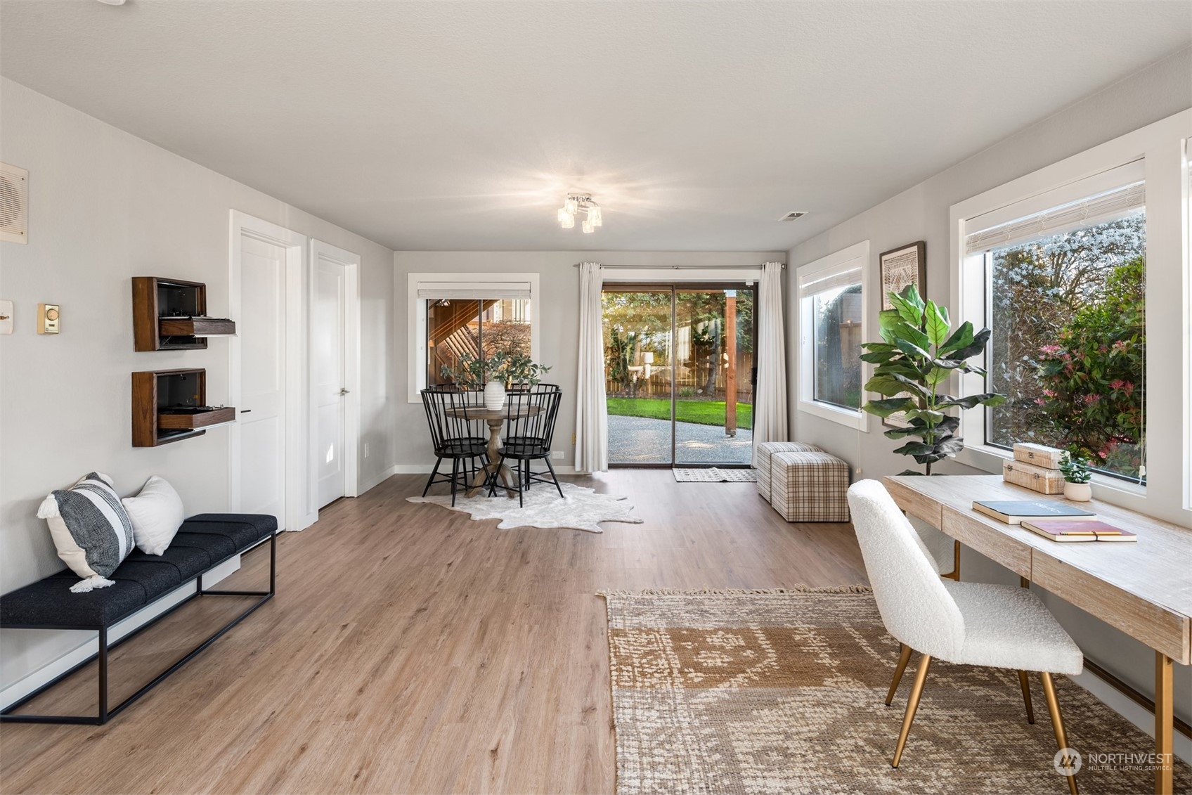 917 9th Avenue South Edmonds, WA 98020 - Photo 26 of 40 a living room with furniture and a wooden floor