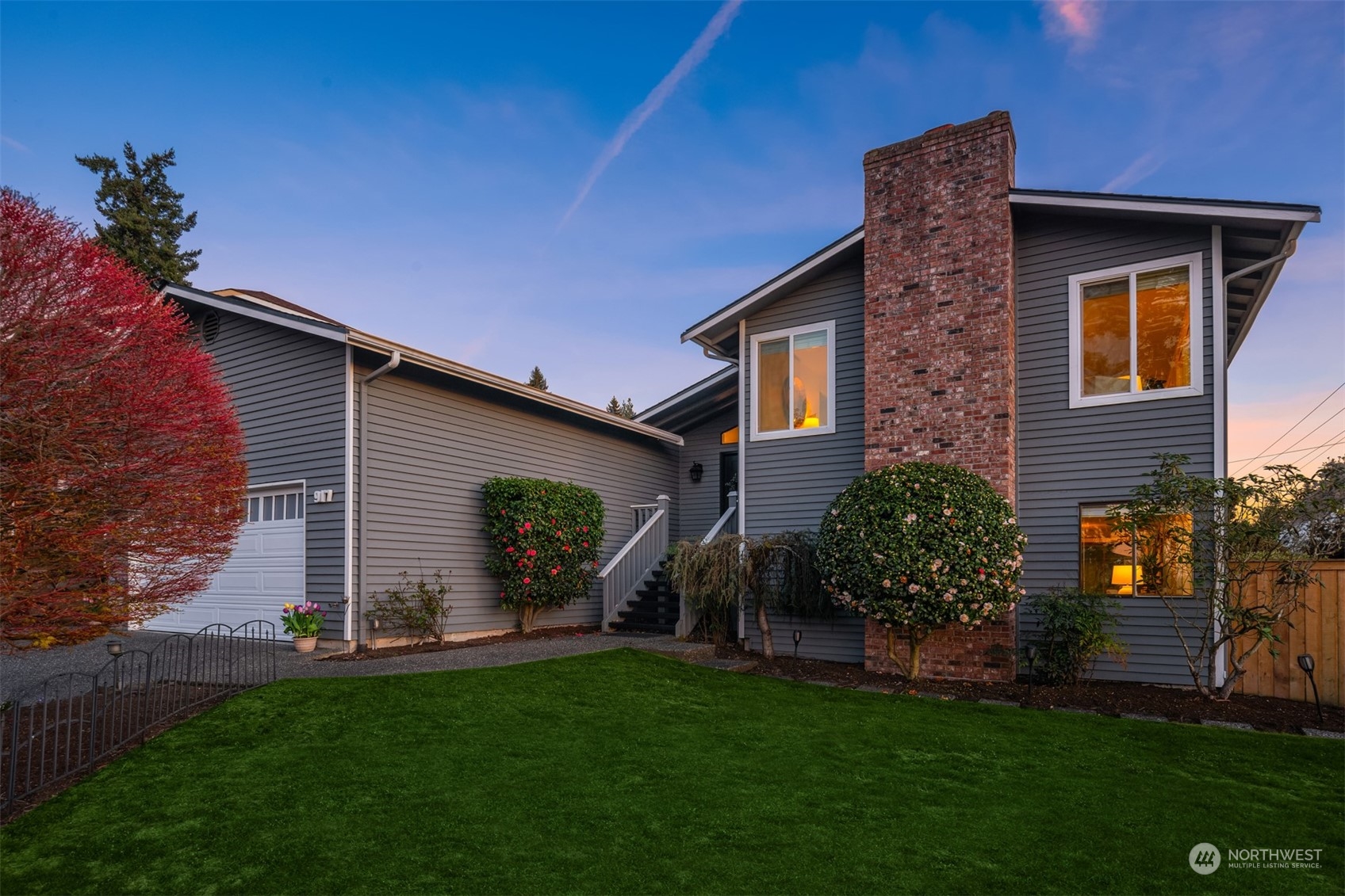917 9th Avenue South Edmonds, WA 98020 - Photo 34 of 40 a front view of a house with a garden and plants