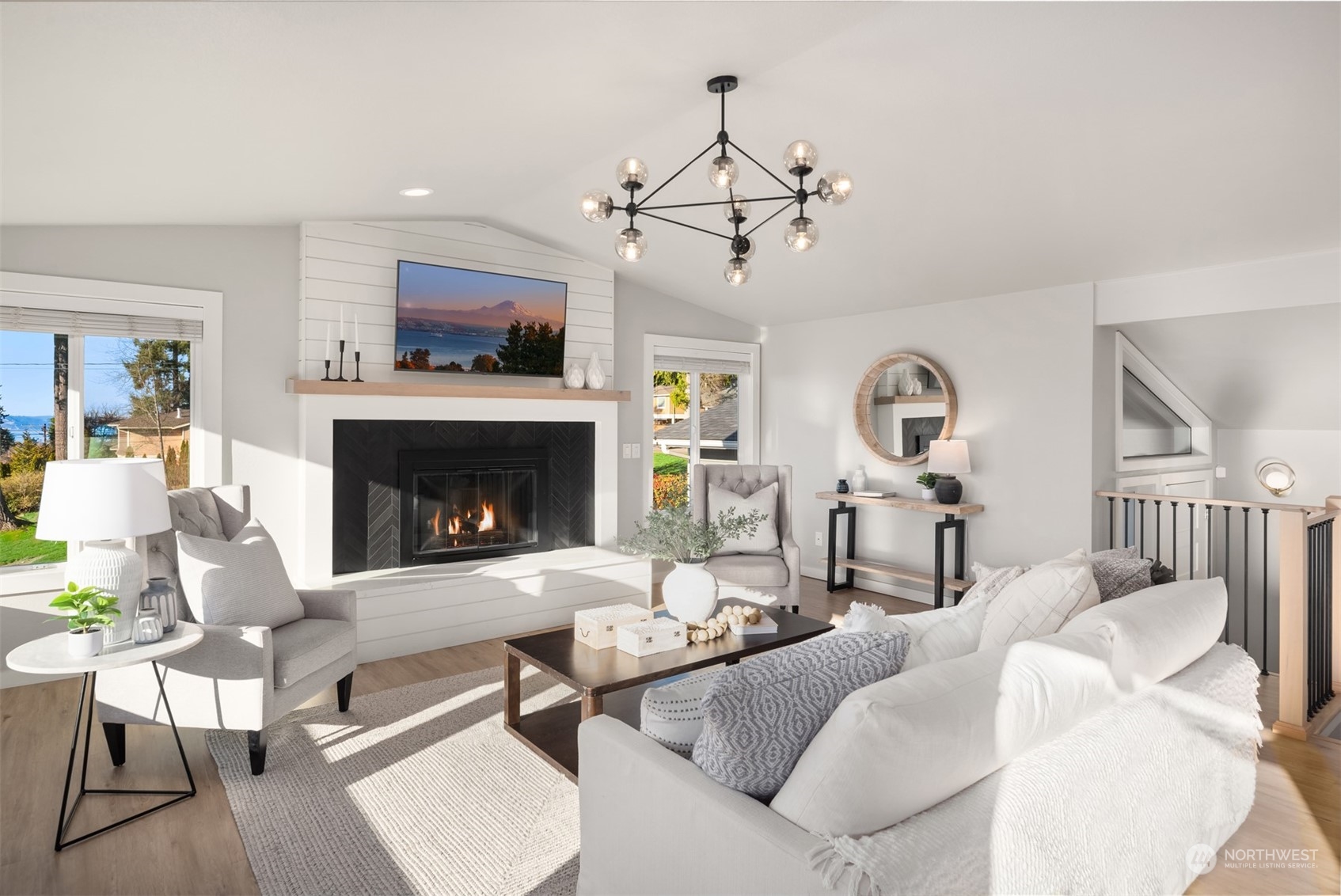 917 9th Avenue South Edmonds, WA 98020 - Photo 8 of 40 a living room with furniture and a fireplace