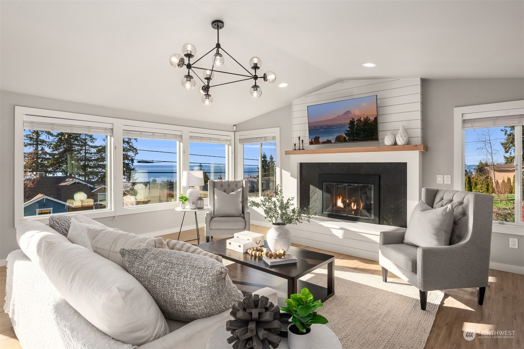 917 9th Avenue South Edmonds, WA 98020 - Photo 9 of 40 a living room with furniture and a fireplace