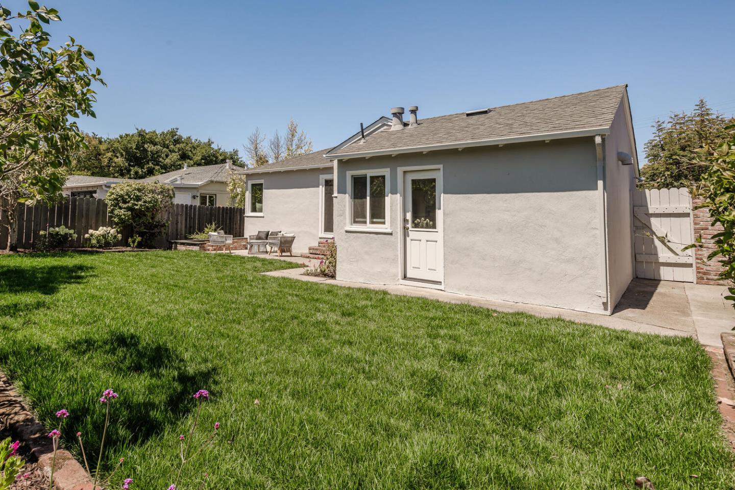367 Millwood Drive Millbrae, CA 94030 - Photo 23 of 25 a front view of house with yard and green space