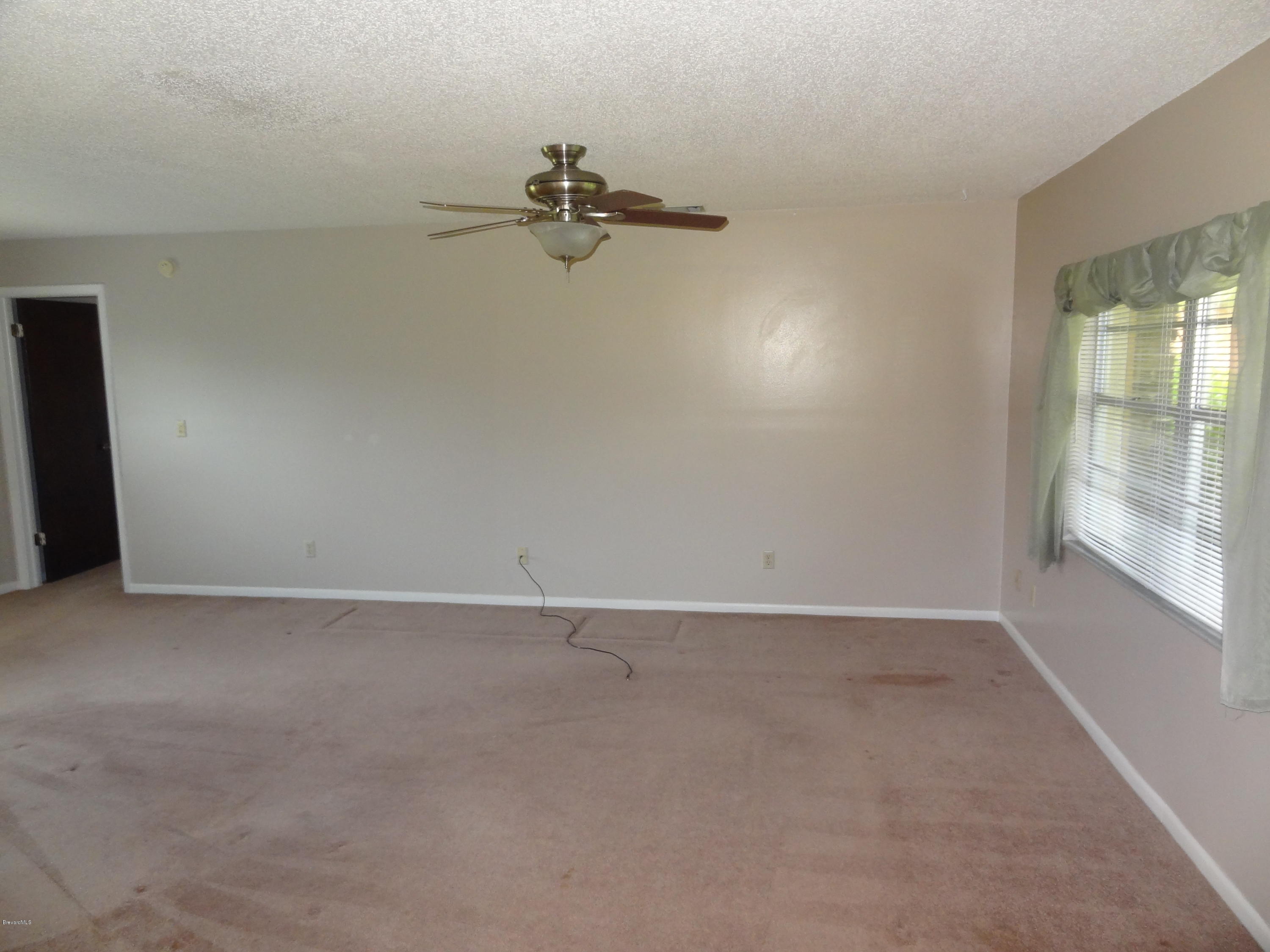 1920 Tallpine Road Melbourne, FL 32935 - Photo 12 of 13 Living 3.jpg