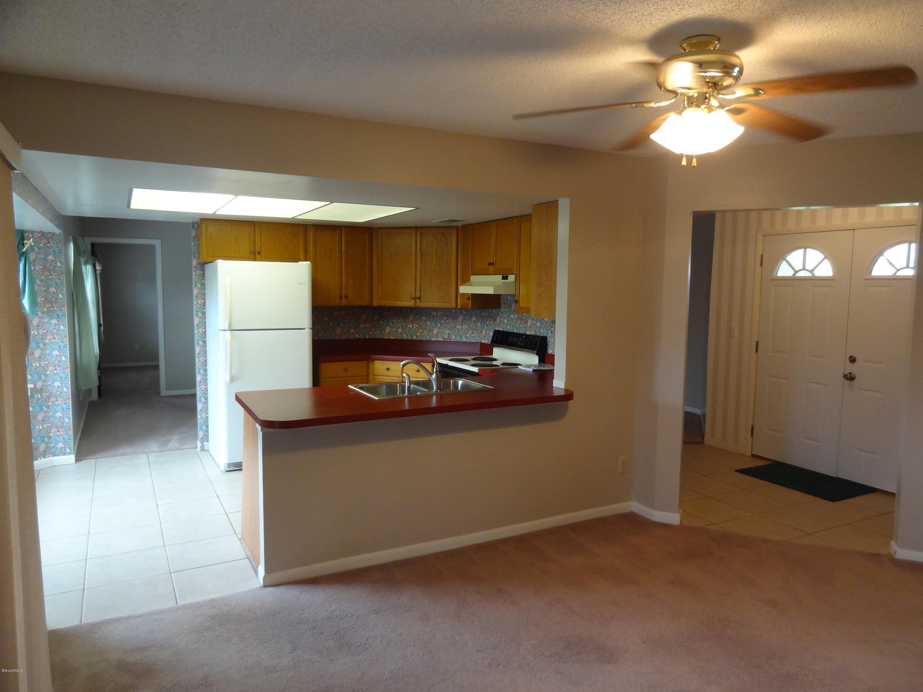 1920 Tallpine Road Melbourne, FL 32935 - Photo 4 of 13 Family Kitch.jpg