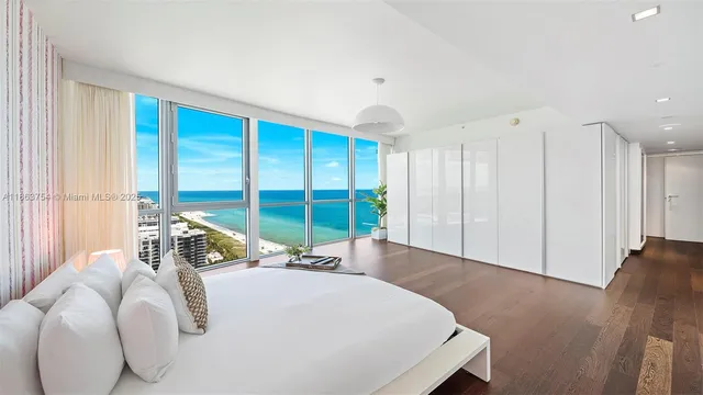 a room with a mirror and shower