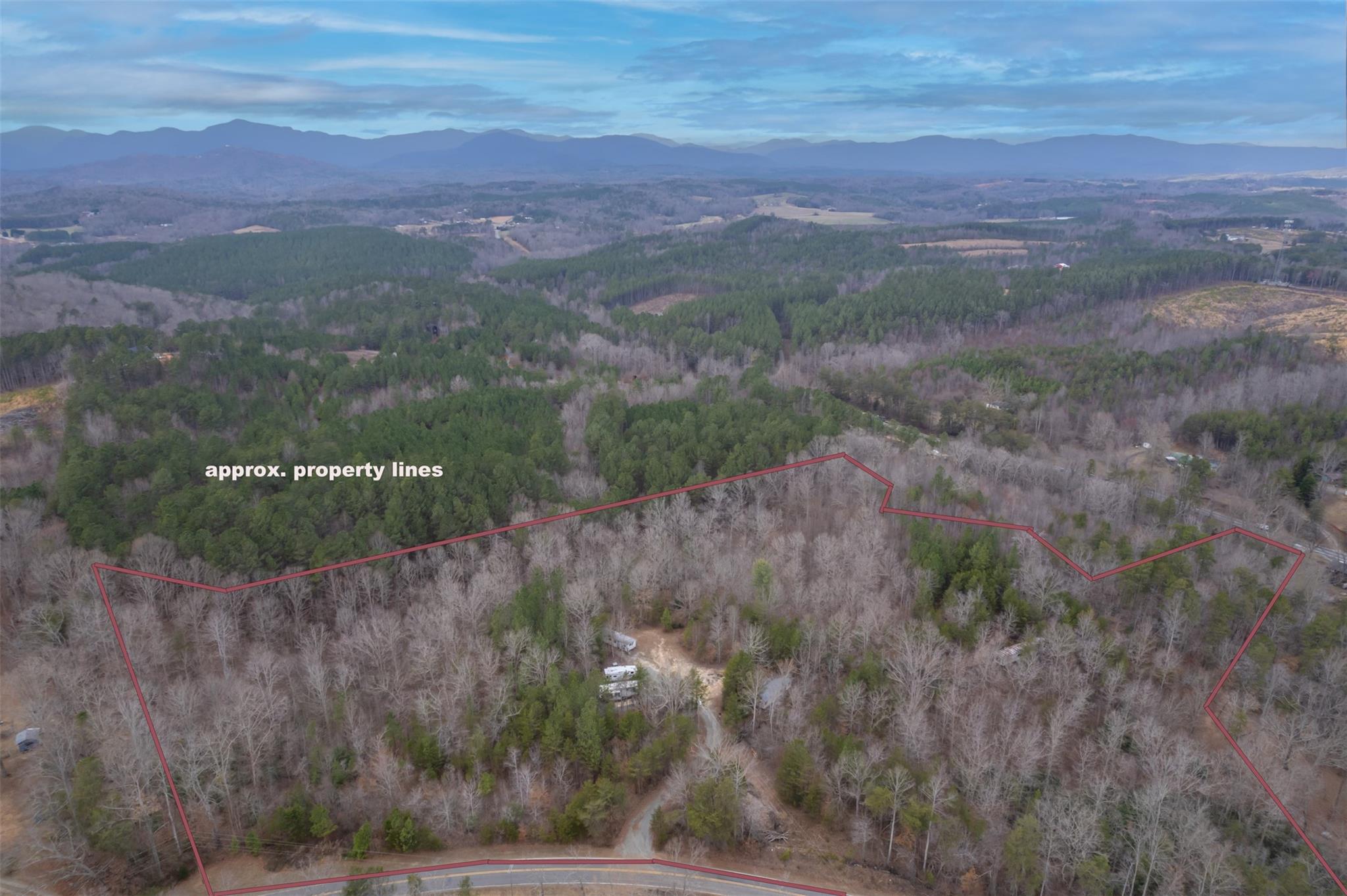 200 Clark Road Rutherfordton, NC 28139 - Photo 20 of 33 a view of a lake with a mountain