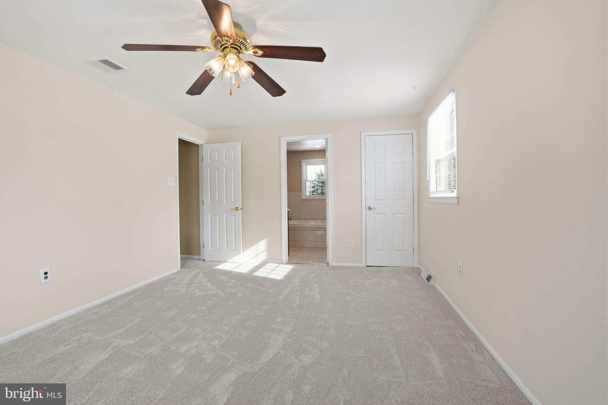 32 Lower Hilltop Road Yardley, PA 19067 - Photo 21 of 37 an empty room with chandelier fan