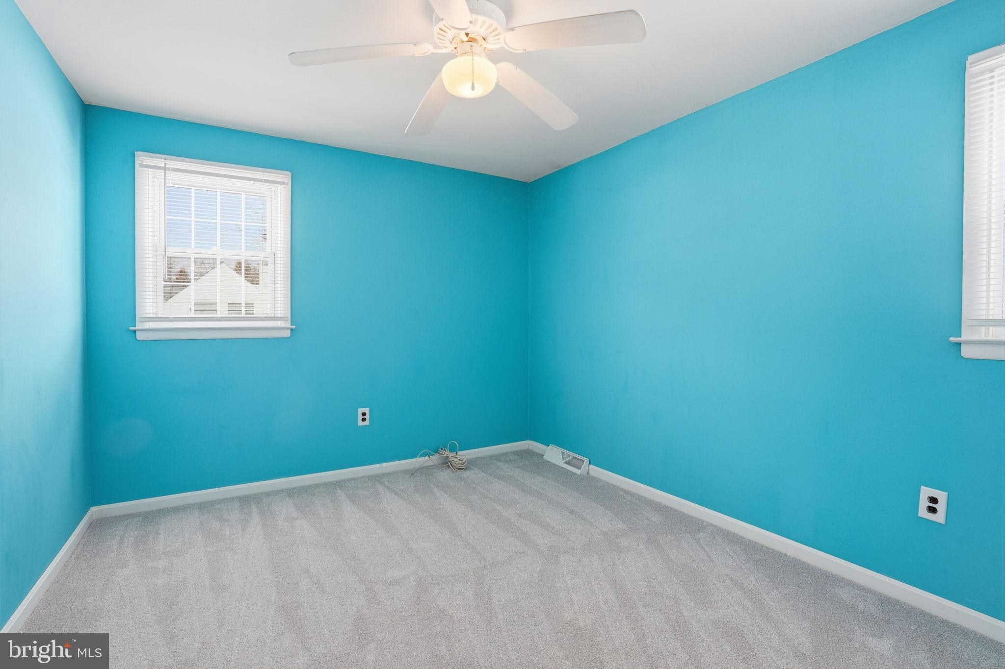 32 Lower Hilltop Road Yardley, PA 19067 - Photo 28 of 37 an empty room with a fan and a window