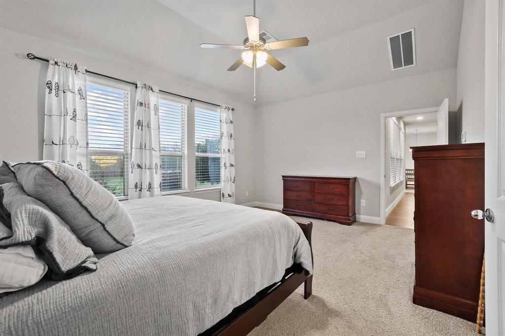 3500 Jersey Road Melissa, TX 75454 - Photo 15 of 40 a bedroom with a bed dresser and a window