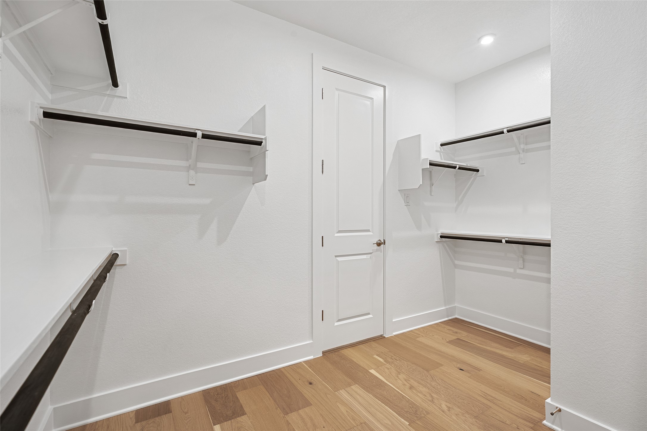 5336 Cosenza Trace Leander, TX 78641 - Photo 24 of 40 Walk in closet with light wood-style flooring