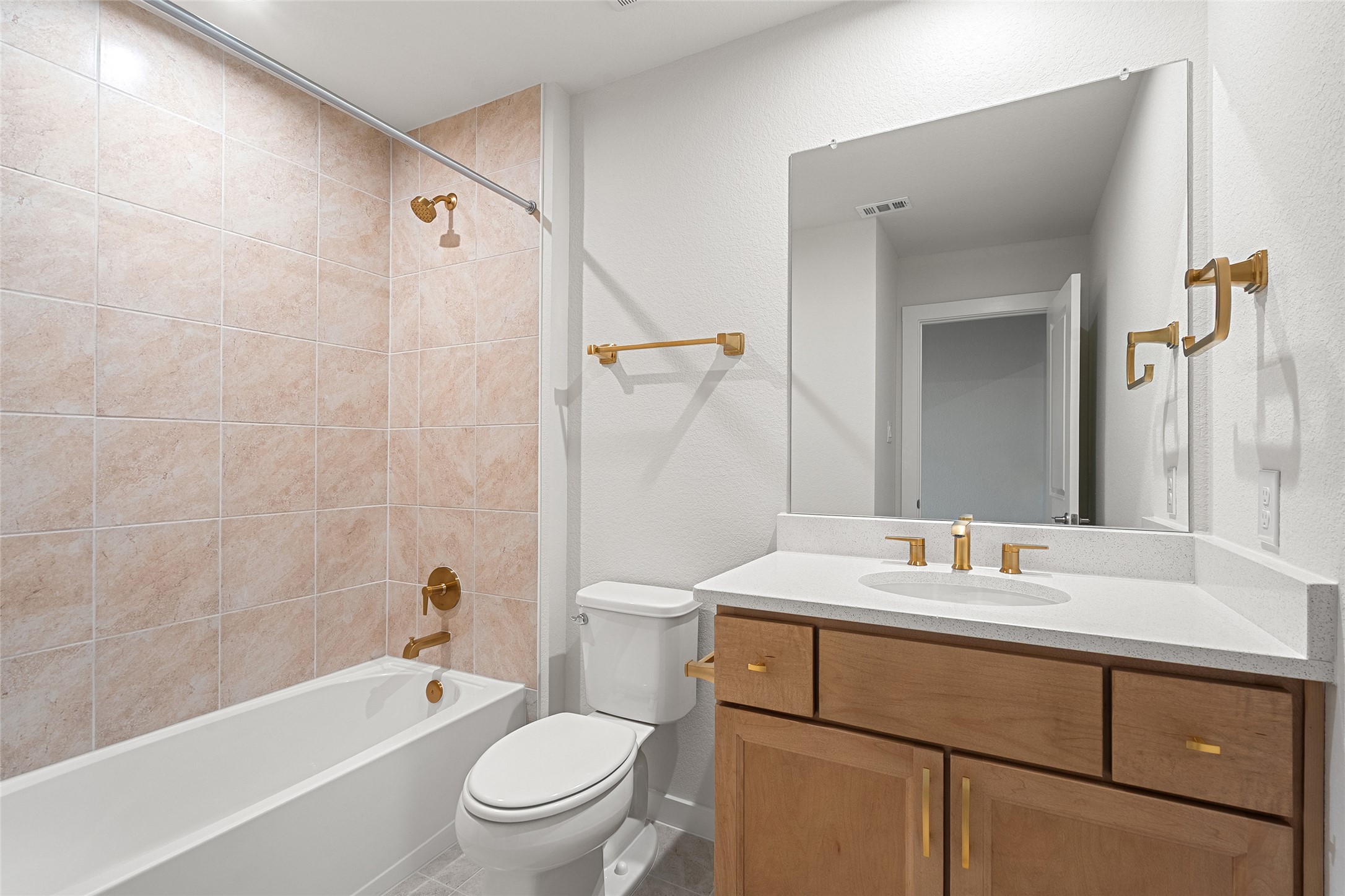 5336 Cosenza Trace Leander, TX 78641 - Photo 31 of 40 Bathroom featuring shower combination and vanity