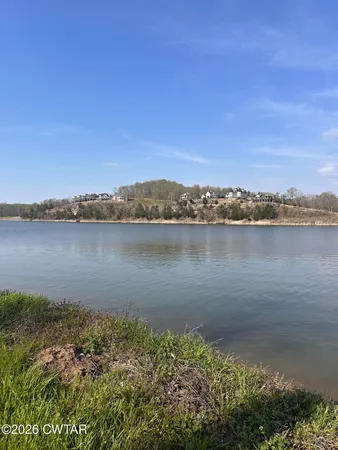 a view of a lake with a beach