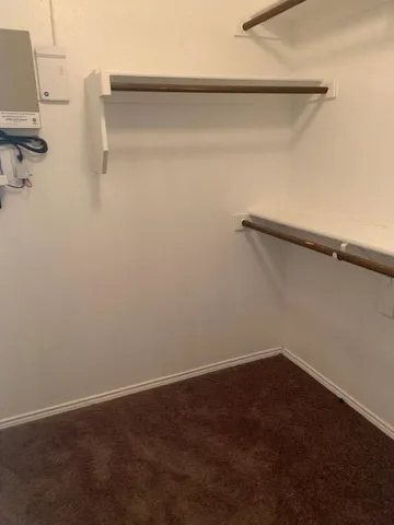 a view of small space with racks on the wall