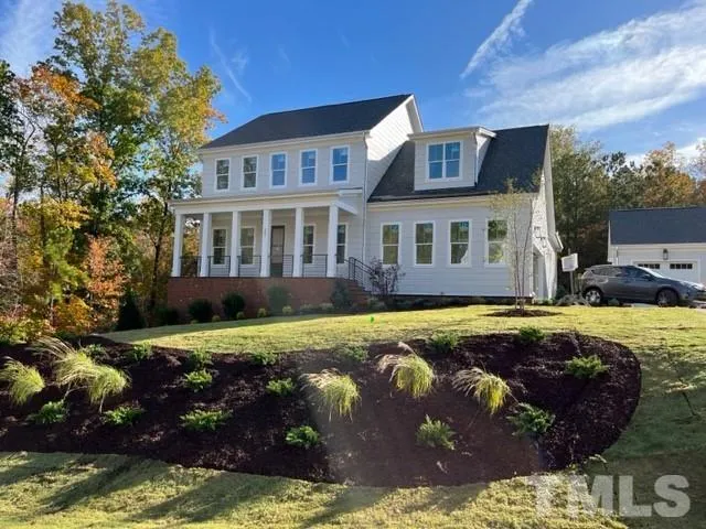 a swimming pool with outdoor seating and yard