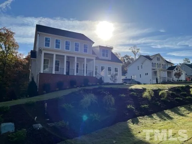 a front view of a house with swimming pool