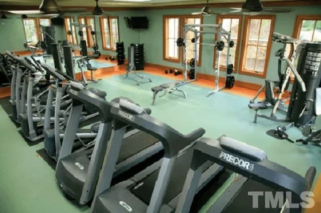 a kitchen with stainless steel appliances granite countertop a sink and a stove
