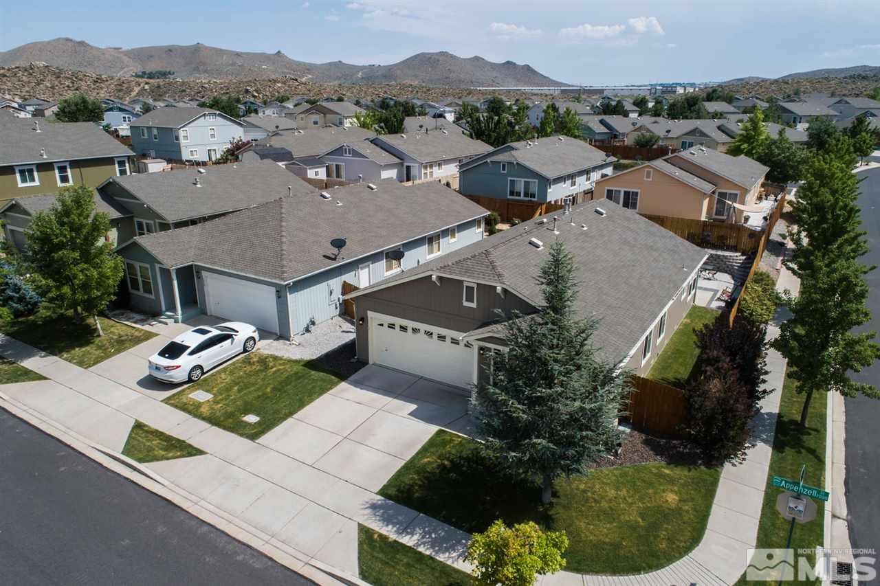 7690 Appenzell Street Reno, NV 89506 - Photo 2 of 25 an aerial view of a house with a garden