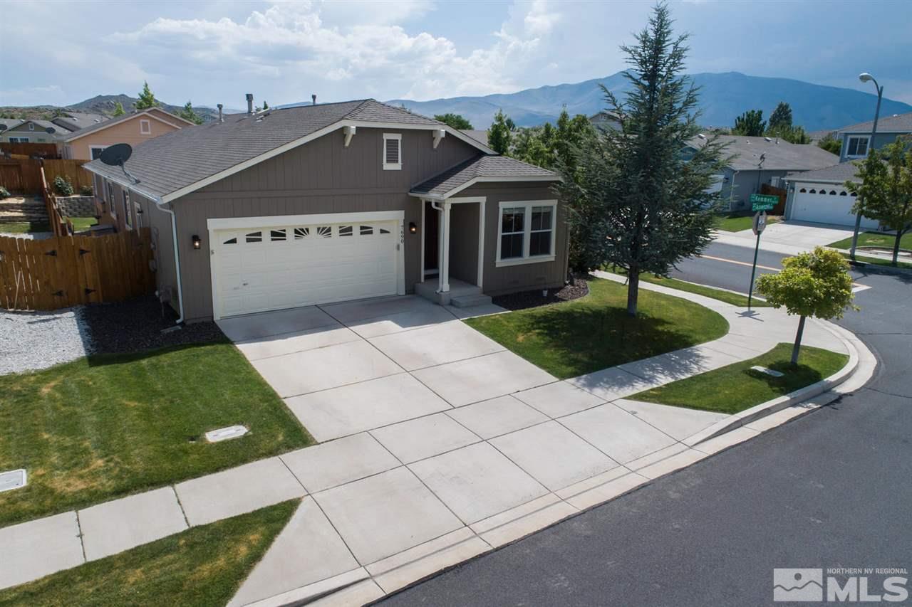 7690 Appenzell Street Reno, NV 89506 - Photo 23 of 25 a front view of a house with garden