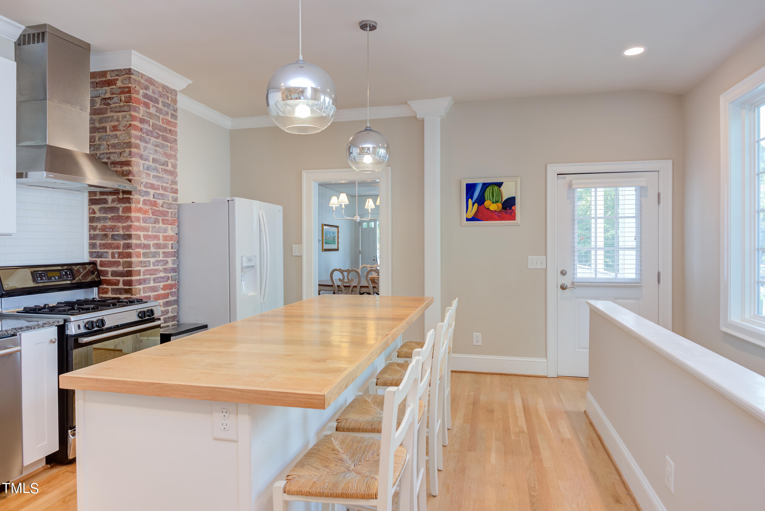 2222 Creston Road Raleigh, NC 27608 - Photo 13 of 57 a very nice looking dining room with a table and chairs