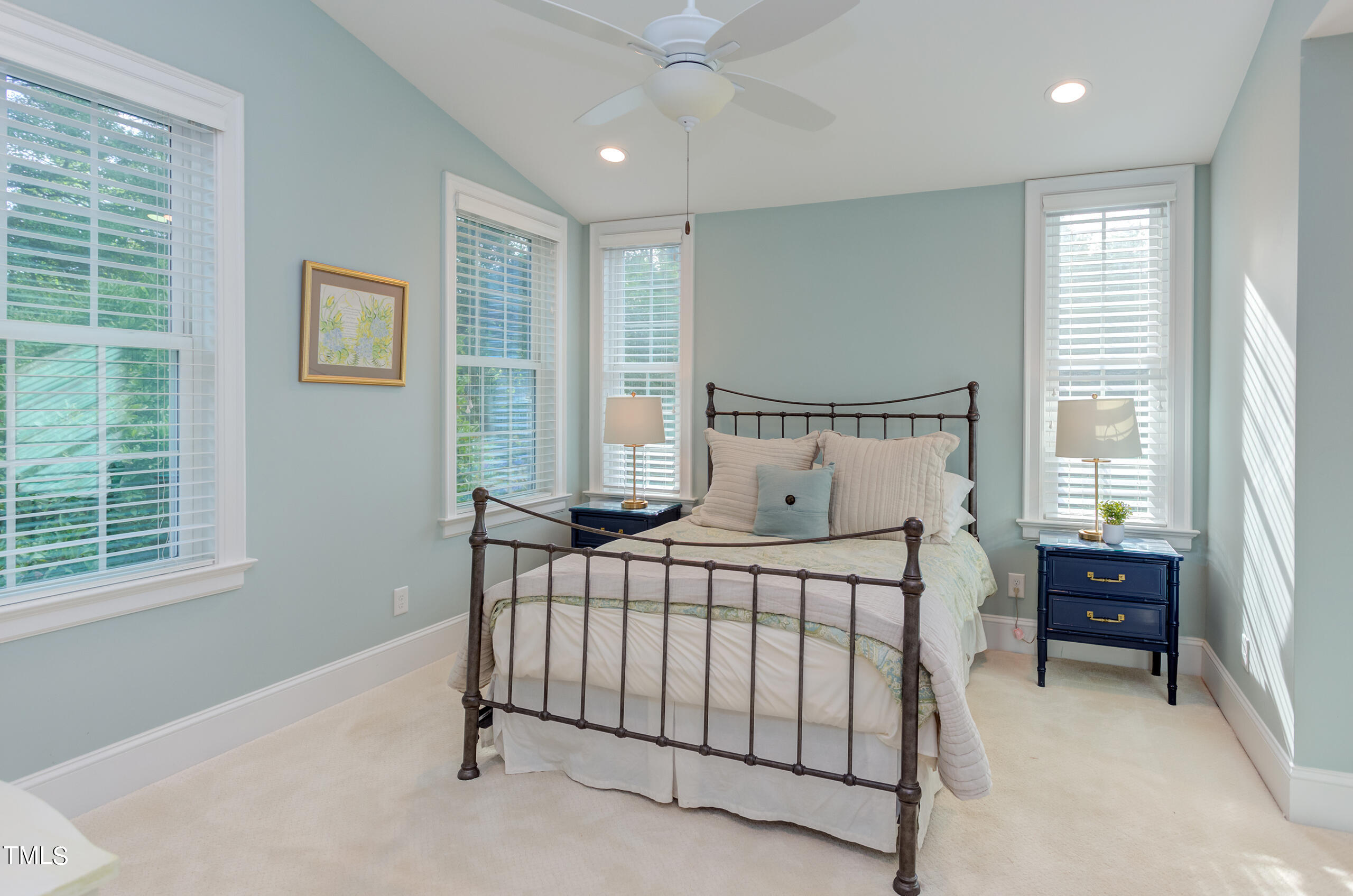2222 Creston Road Raleigh, NC 27608 - Photo 26 of 57 a bedroom with a bed and a window