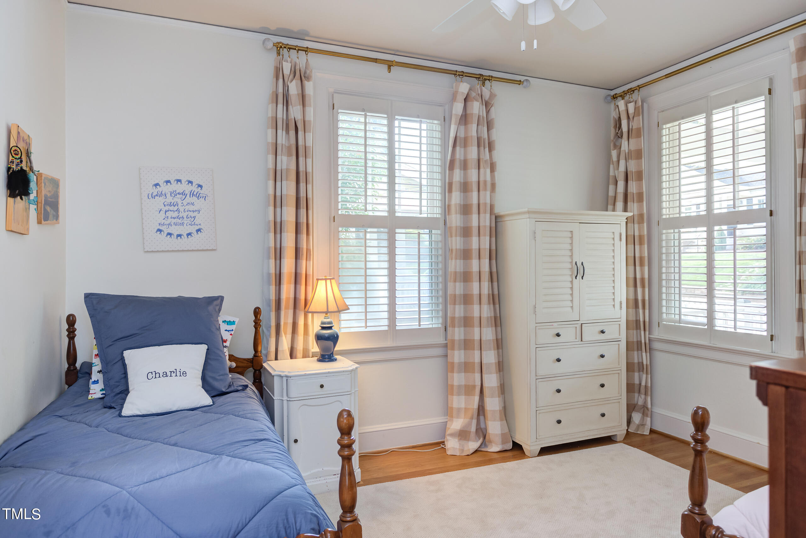 2222 Creston Road Raleigh, NC 27608 - Photo 32 of 57 a bedroom with furniture and a window