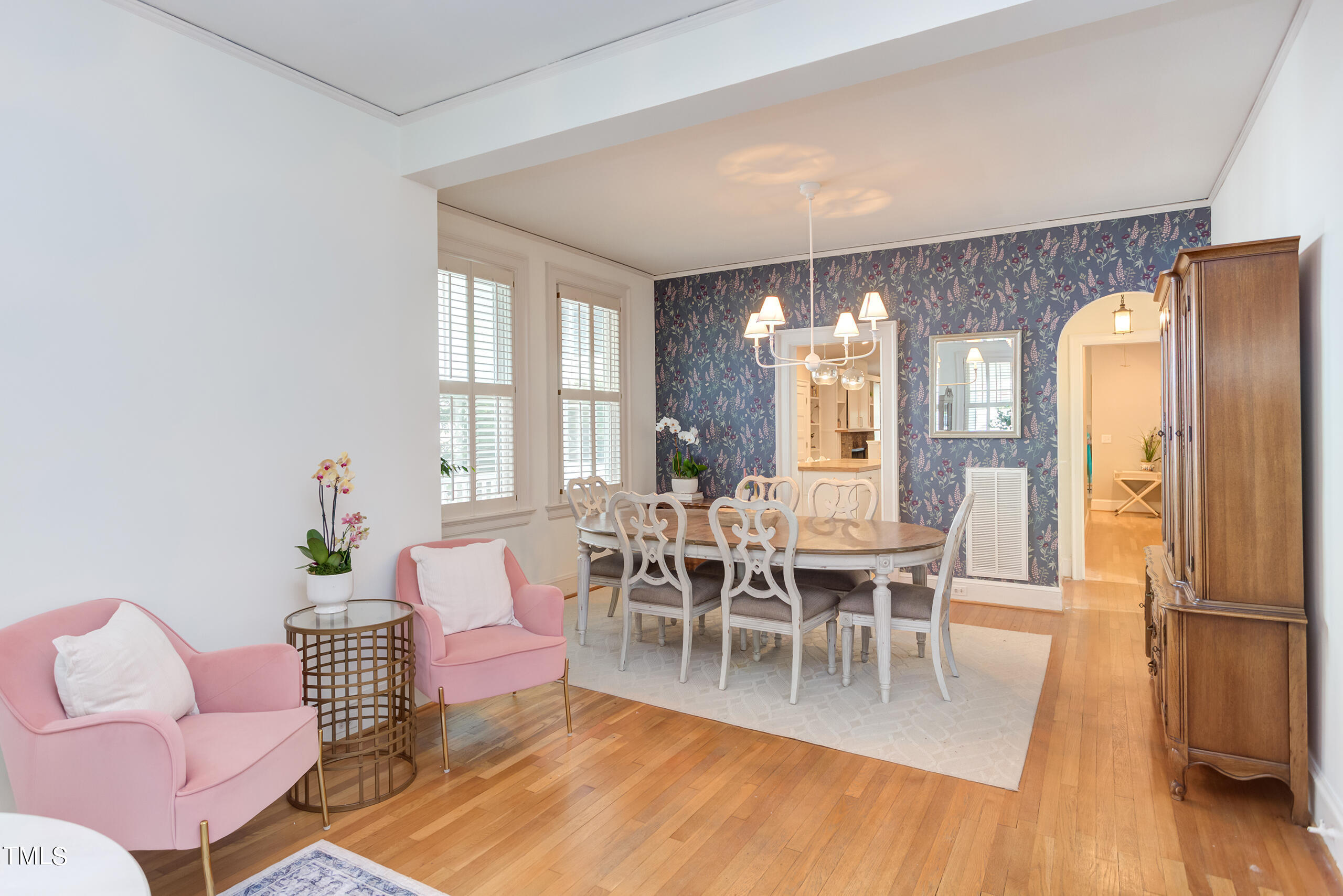 2222 Creston Road Raleigh, NC 27608 - Photo 4 of 57 a view of a dining room with furniture window and wooden floor