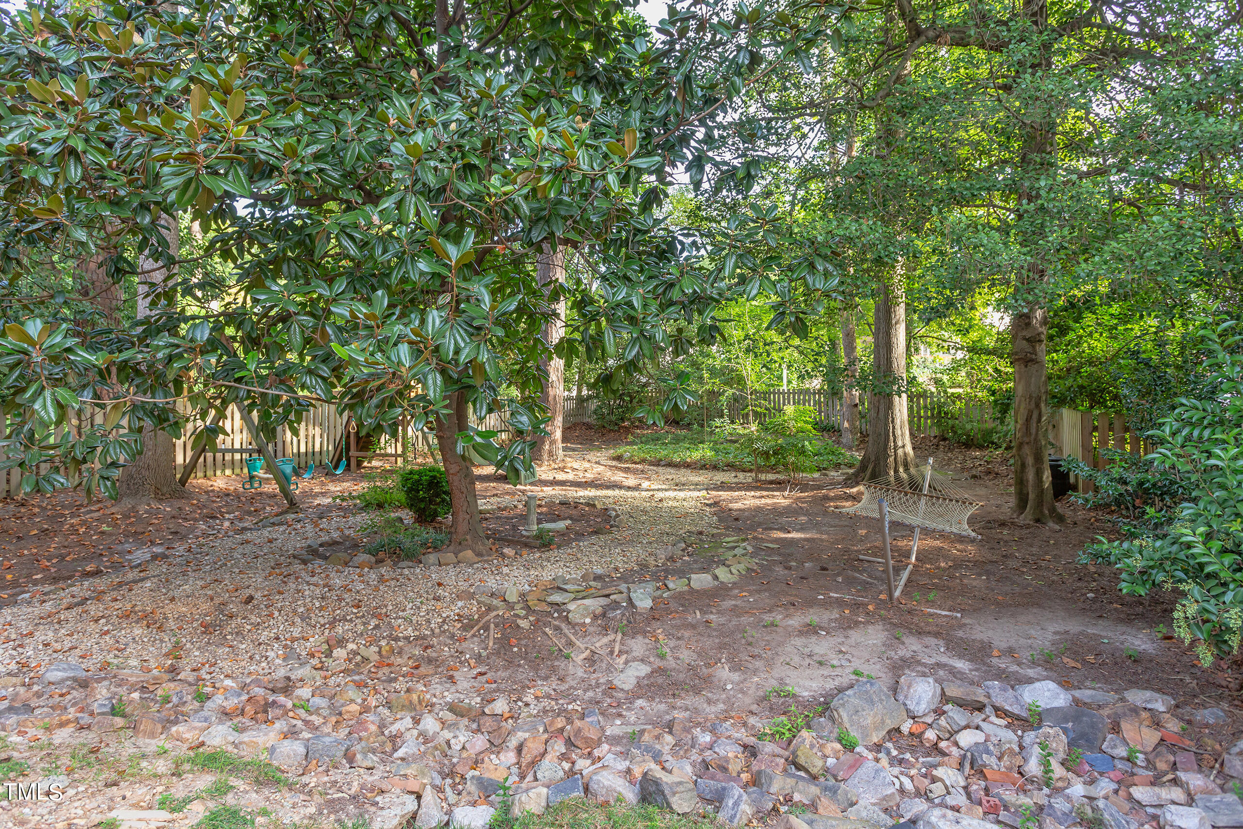 2222 Creston Road Raleigh, NC 27608 - Photo 49 of 57 a view of a forest with trees in the background