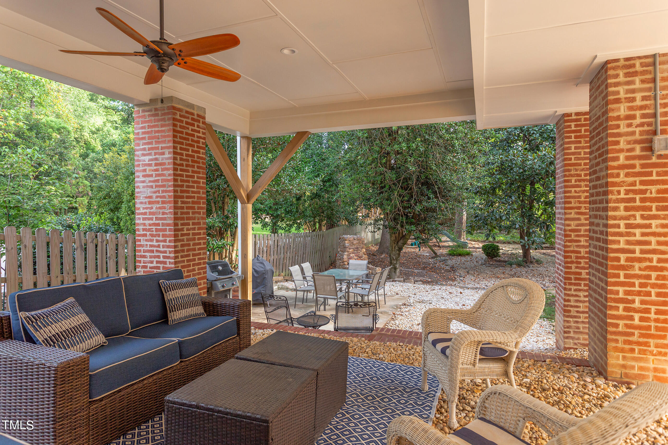 2222 Creston Road Raleigh, NC 27608 - Photo 54 of 57 a outdoor living space with furniture and garden view