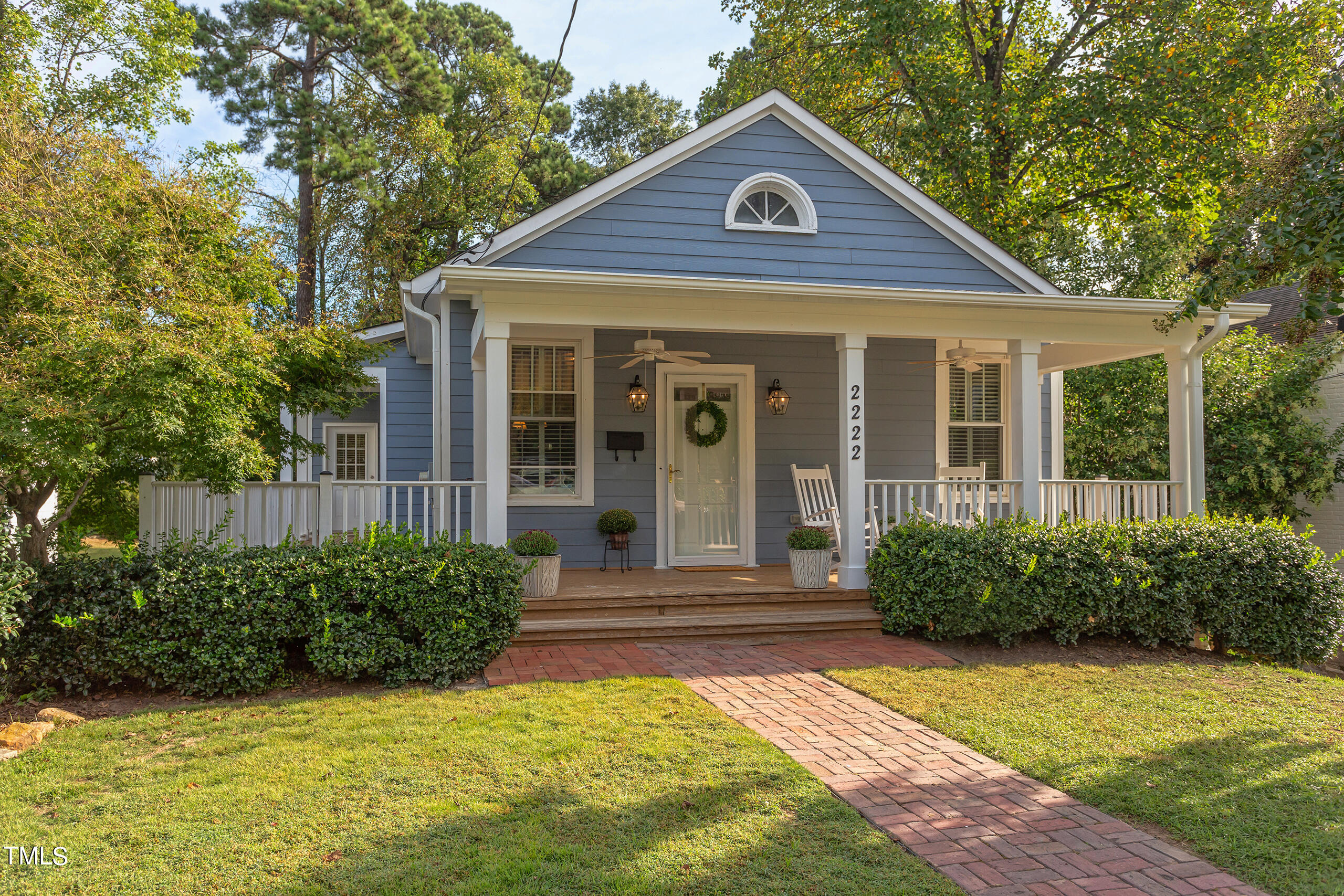 2222 Creston Road Raleigh, NC 27608 - Photo 57 of 57 a front view of a house with a yard