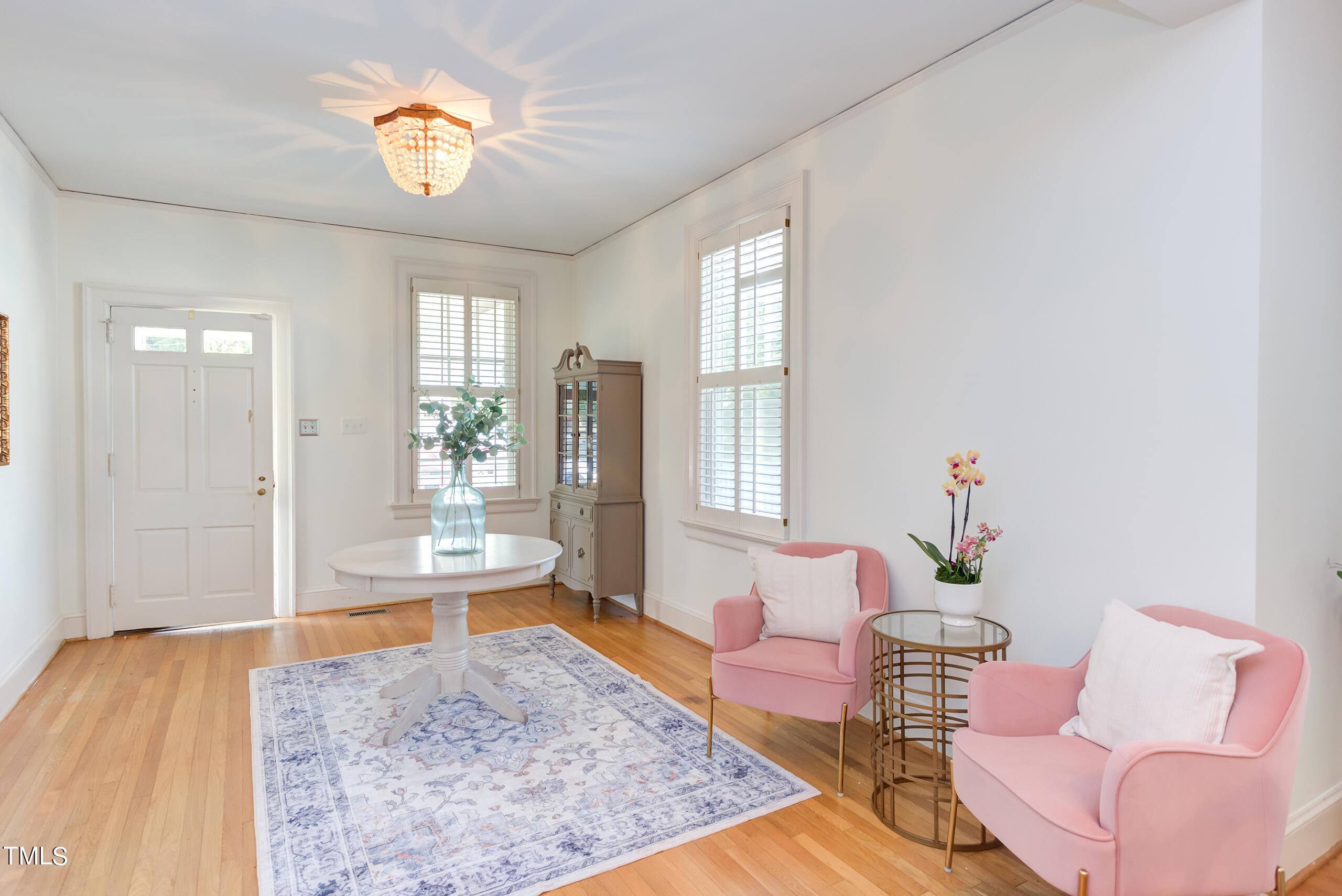 2222 Creston Road Raleigh, NC 27608 - Photo 7 of 57 a living room with furniture and a table
