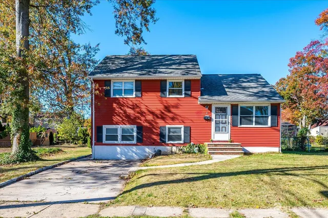 a front view of house with yard