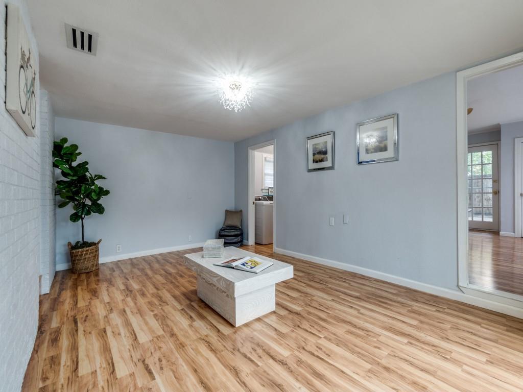 5739 Ellsworth Avenue Dallas, TX 75206 - Photo 18 of 38 a living room with a couch and a potted plant