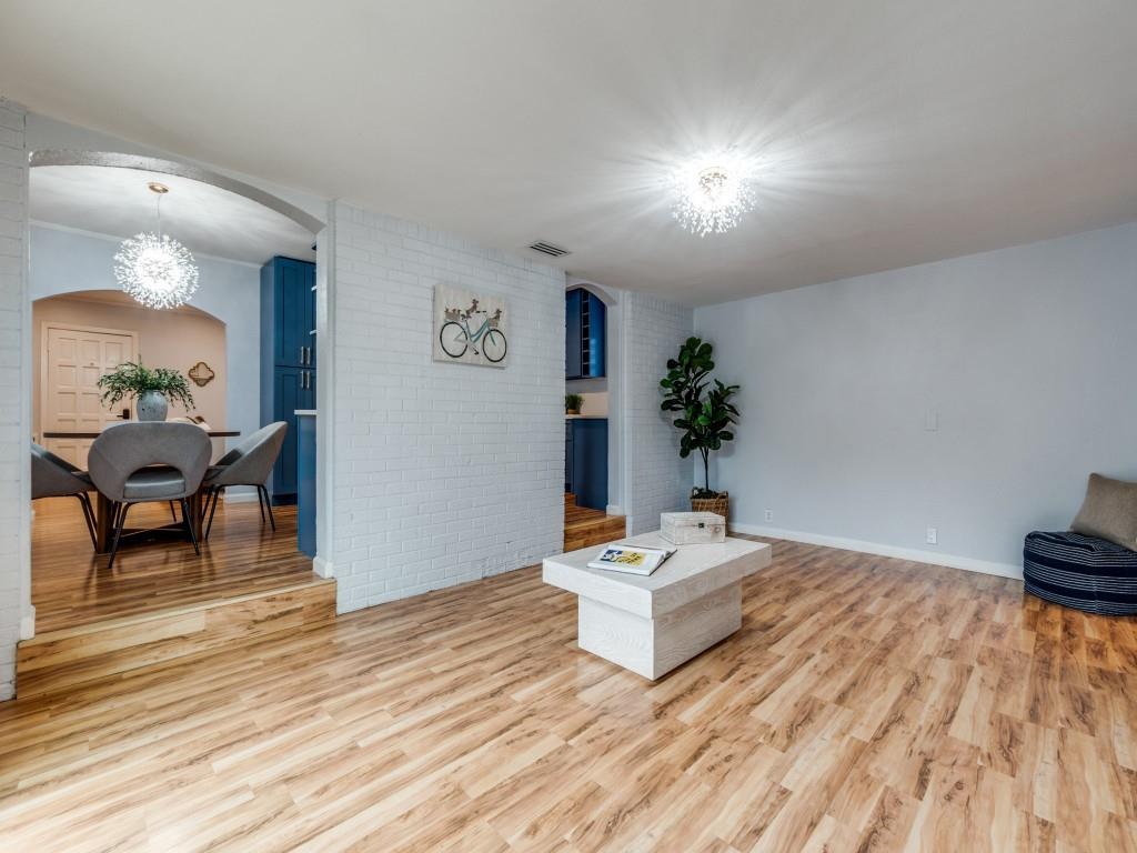5739 Ellsworth Avenue Dallas, TX 75206 - Photo 19 of 38 a living room with furniture and wooden floor