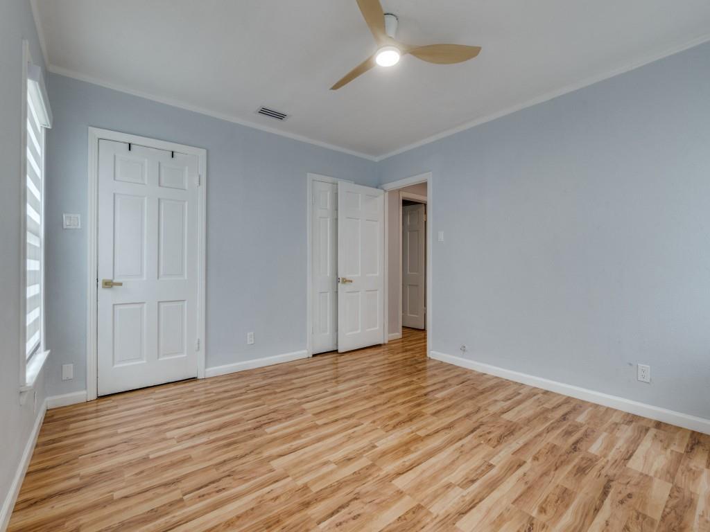 5739 Ellsworth Avenue Dallas, TX 75206 - Photo 27 of 38 a view of an empty room with wooden floor