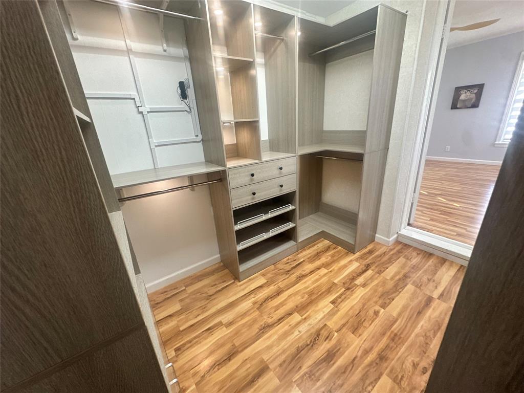 5739 Ellsworth Avenue Dallas, TX 75206 - Photo 29 of 38 a bedroom with a bed and a window