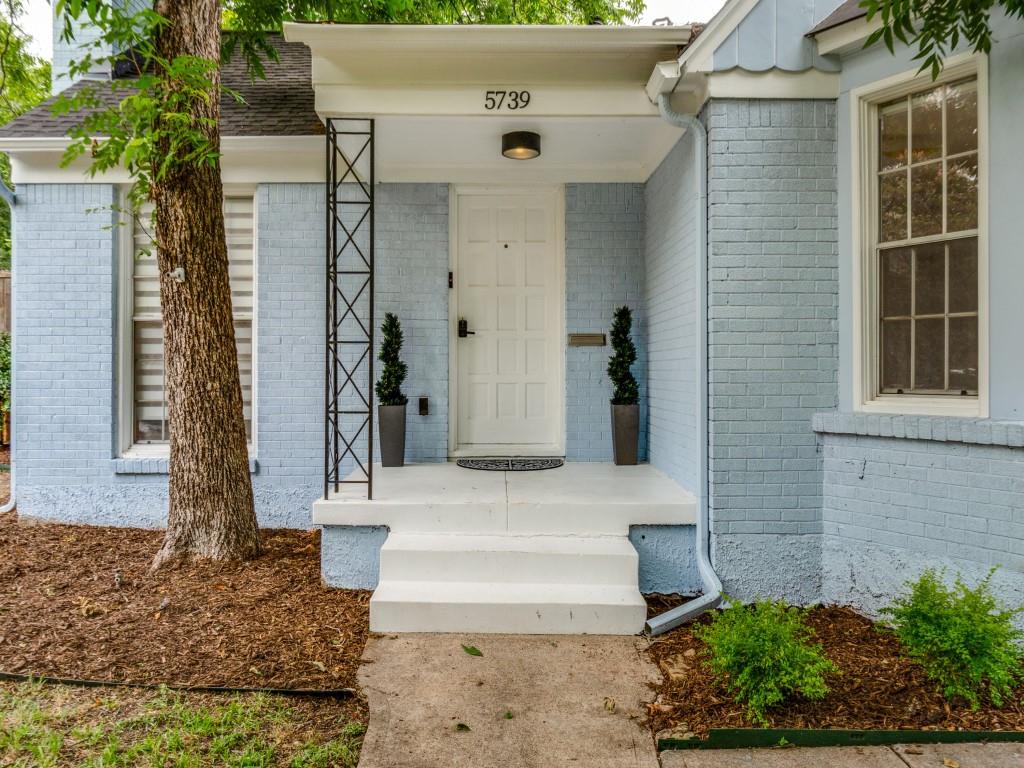5739 Ellsworth Avenue Dallas, TX 75206 - Photo 33 of 38 a front view of a house with a yard