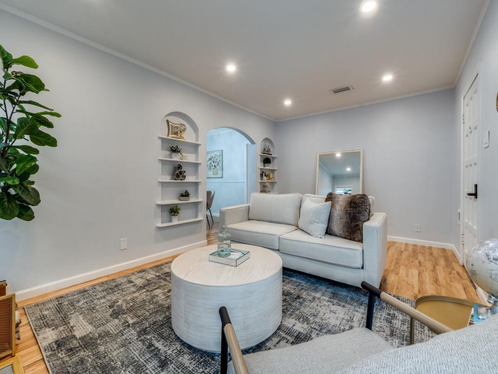 5739 Ellsworth Avenue Dallas, TX 75206 - Photo 6 of 38 a living room with furniture and a wooden floor