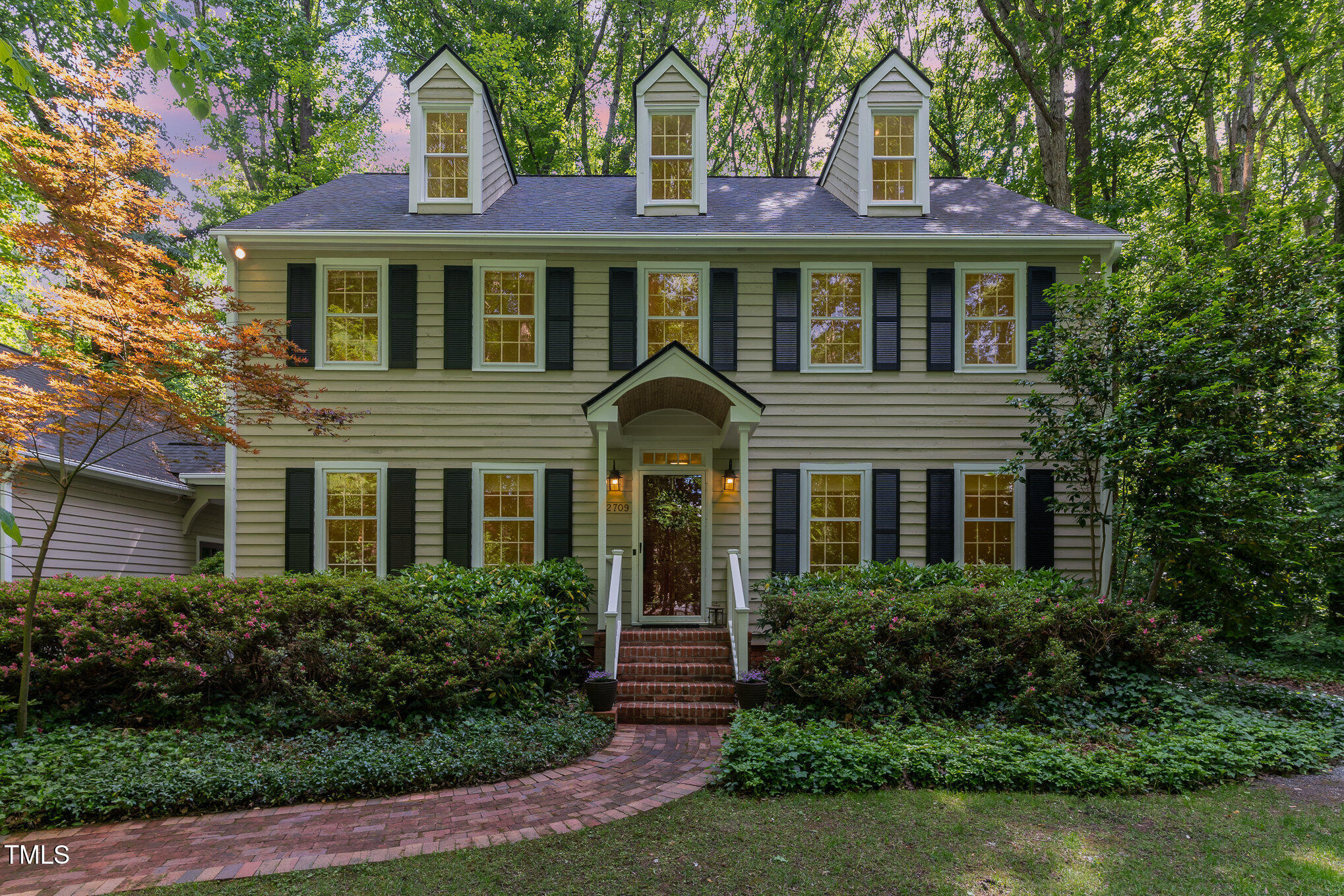 12709 Timberlane Court Raleigh, NC 27613 - Photo 41 of 44 a front view of a house with garden