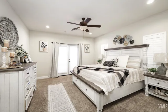 a bedroom with bed and window