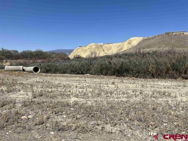 Tbd Tbd Moon Dance Delta, CO 81416 - Photo 6 of 13 a view of a dry yard with mountains