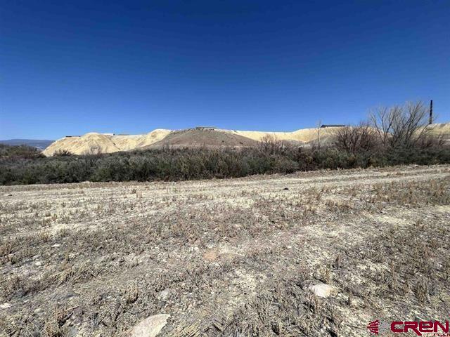 Tbd Tbd Moon Dance Delta, CO 81416 - Photo 7 of 13 a view of a dry yard with mountain
