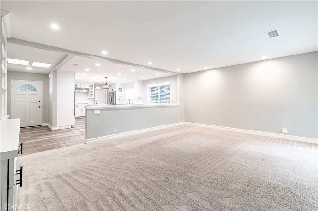 4580 Hazelnut Avenue Seal Beach, CA 90740 - Photo 16 of 35 a view of a kitchen with a sink and a window