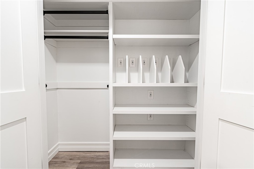 4580 Hazelnut Avenue Seal Beach, CA 90740 - Photo 20 of 35 a view of walk in closet with empty racks
