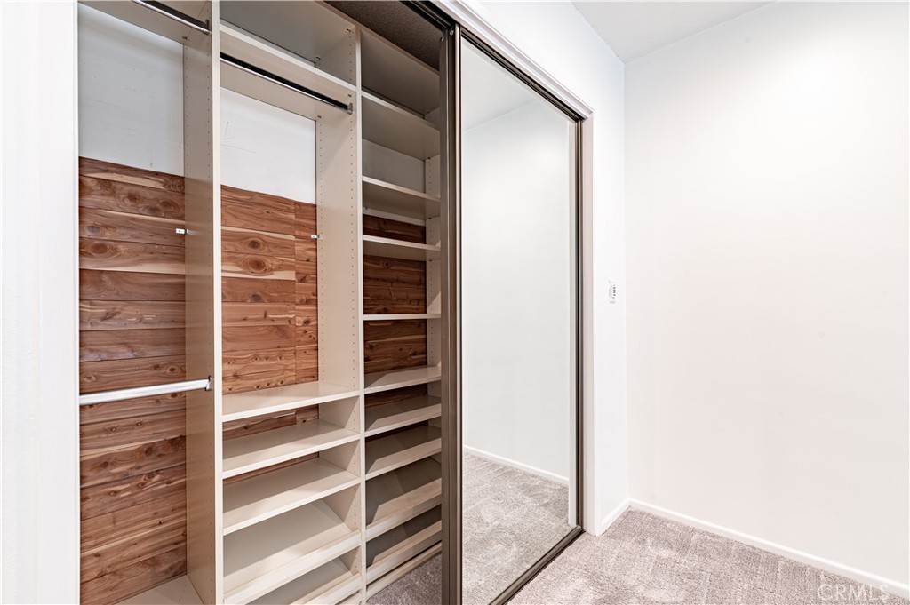 4580 Hazelnut Avenue Seal Beach, CA 90740 - Photo 30 of 35 a view of closet area with empty racks