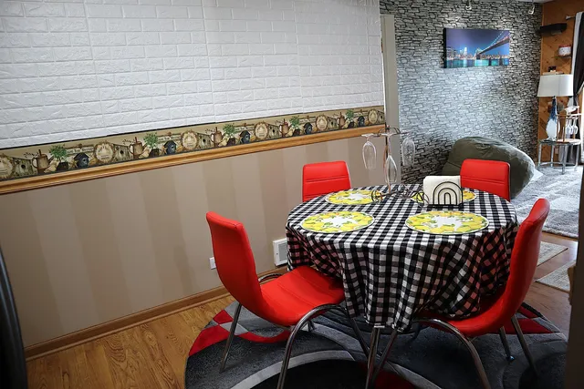 a view of a dining room with furniture