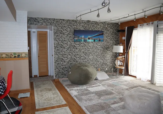 a room with furniture and a fireplace