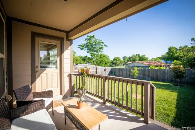 a view of a two chairs in the roof deck