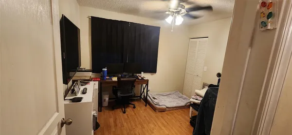 a view of a bathroom with a sink and mirror