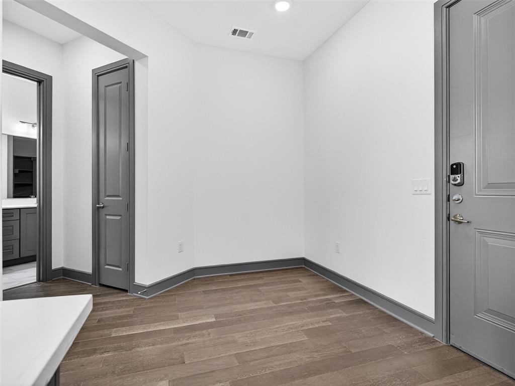 2700 Old Denton Road, Unit 3370 Carrollton, TX 75007 - Photo 21 of 35 a view of a room with wooden floor